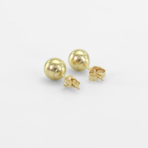 Goldene Ohrringe in Kugelform Bendy