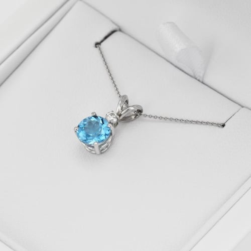 Goldanhänger mit Topas und Diamanten Emolyna