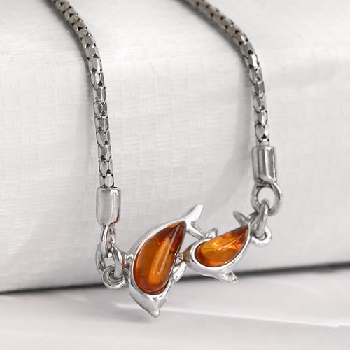 Silbernes Armband mit Bernstein und Delfin Kisha