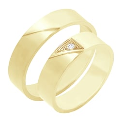 Trendy Eheringe aus Gold mit einem Diamanten Mert