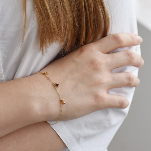 Goldenes Armband mit Citrin, Granat und Saphir Veera