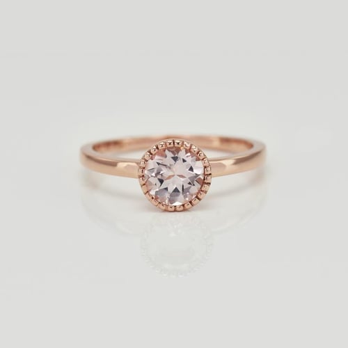 Ring aus Gold mit Morganit Swan