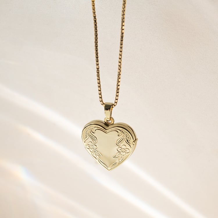 Silbernes Medaillion in Herzform zum Öffnen 140324