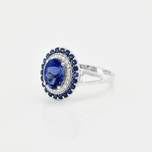 Goldener Tansanitring mit Diamanten und Saphir Mamisi