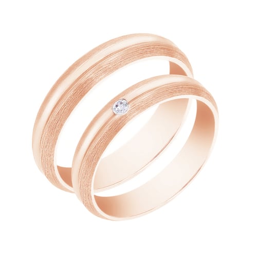 Goldene Eheringe mit Diamant Dellai