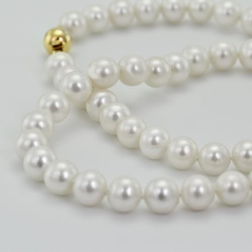 Goldenes Schmuckset mit 7-7.50mm Perlen Doretta