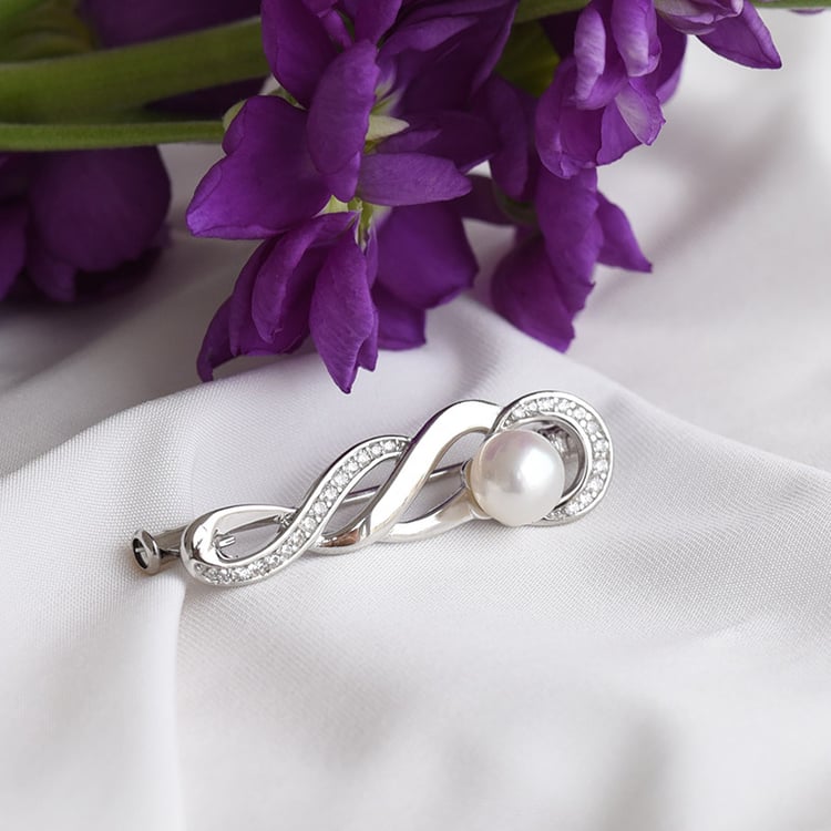 Dezente geflochtene Brosche mit Perle und Zirkonia Avra 83464