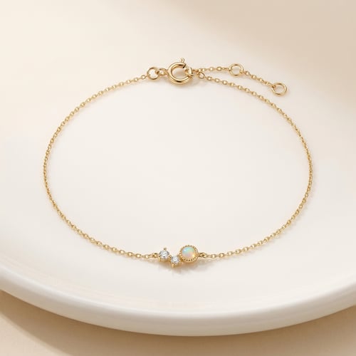 Goldenes Armband mit Opal und Saphiren Petia