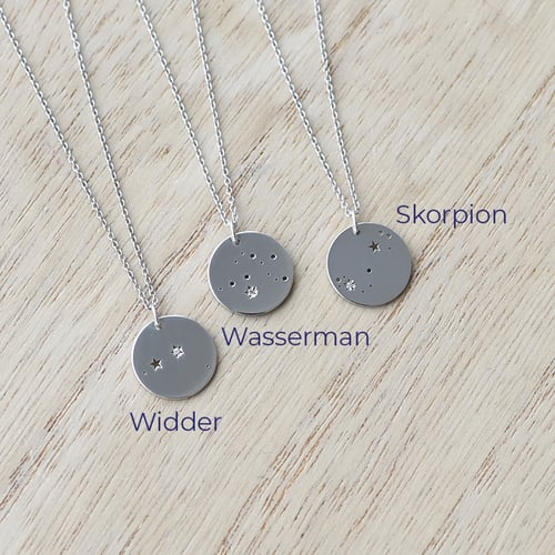 Goldener Anhänger mit Sternbild und Diamant Nyala