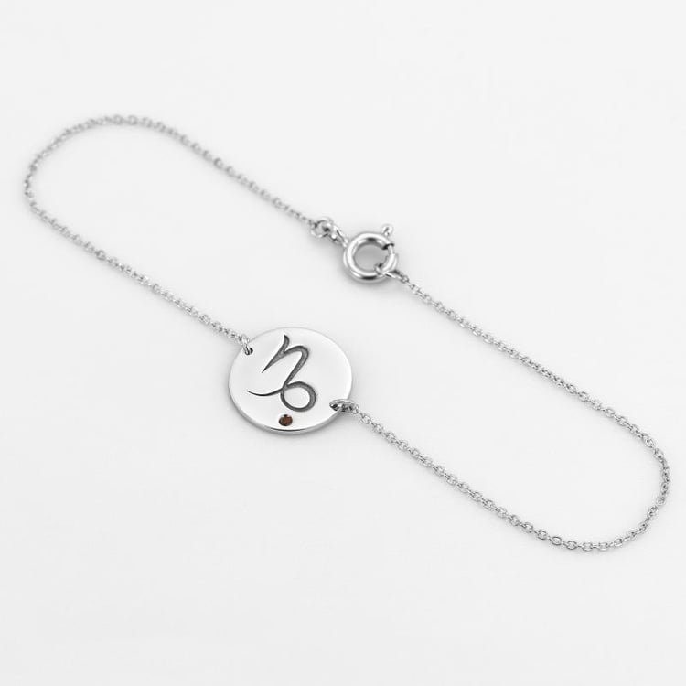 Weißgold Armband mit Steinbock Sternzeichen und Granat 47682