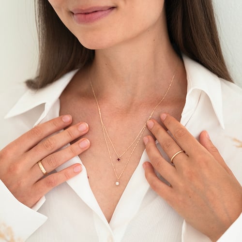 Goldene Kette mit Perle und Rubin Auburn