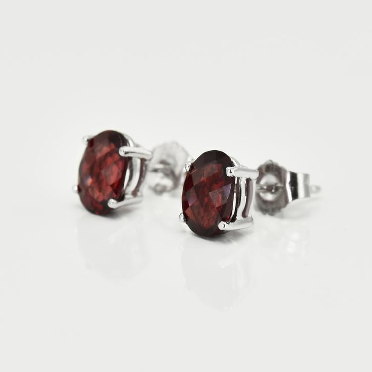 Goldene Ohrringe mit ovalen Granaten Qati 17247