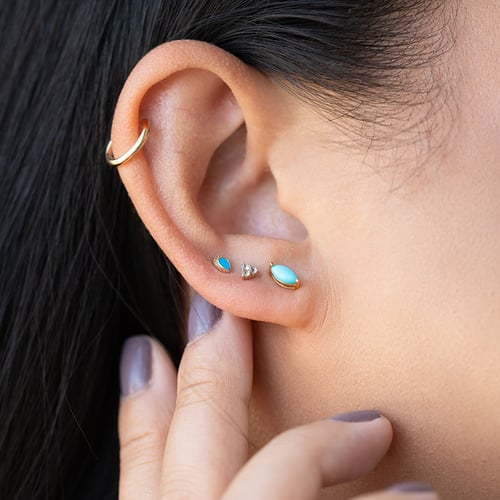 Goldener Piercingstecker mit Türkisen Wendy