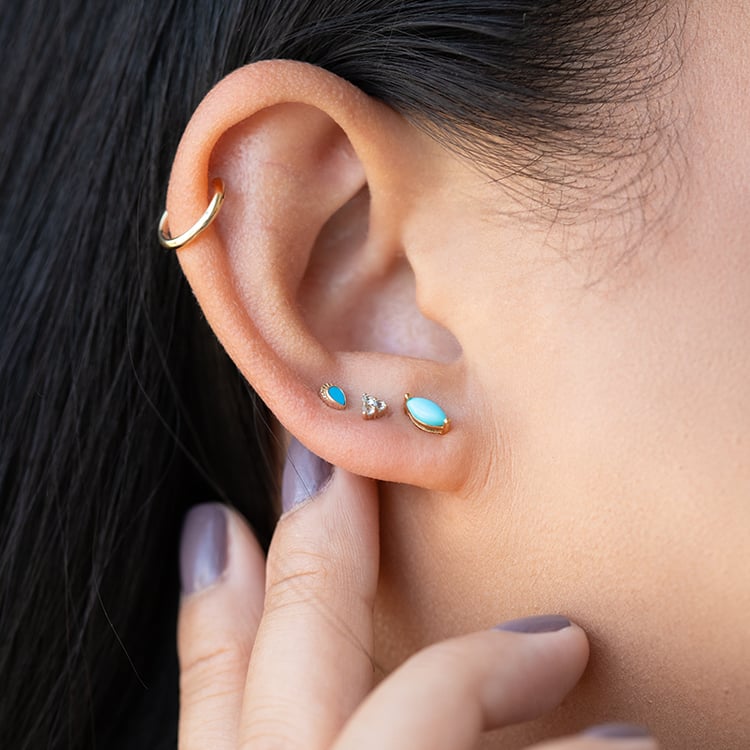 Goldener Piercingstecker mit Türkisen Wendy 126553