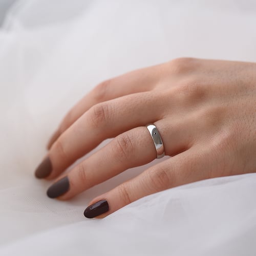 Klassische Trauringe aus Gold mit blauem Diamant Zavala