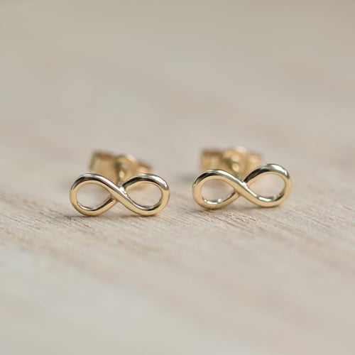 Schmuckset aus Gold mit Unendlichkeitszeichen Infinity
