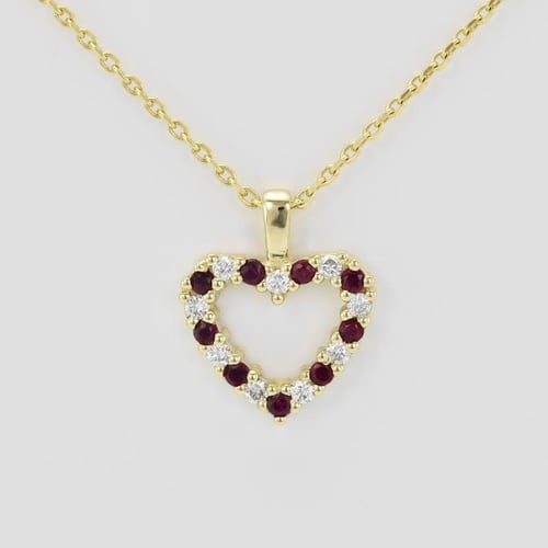 Goldenes Herz voller Rubine und Diamanten Devamati