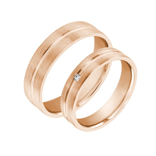 Goldene Eheringe mit Diamanten Toon