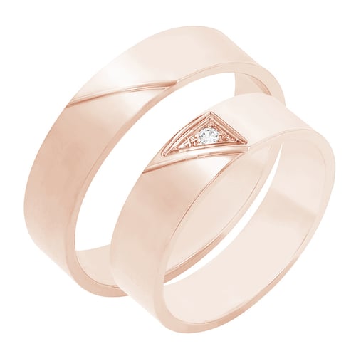 Trendy Eheringe aus Gold mit einem Diamanten Mert