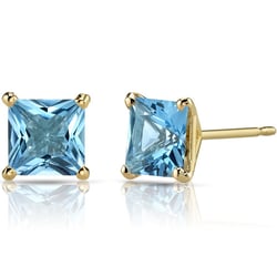 Goldene Ohrringe mit Blautopasen Enola