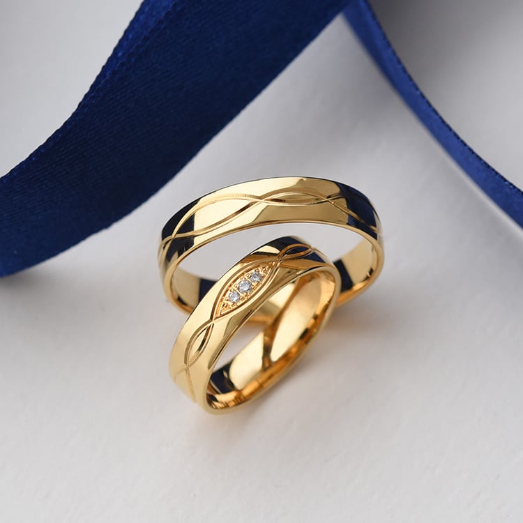 Eheringe aus Gold mit Gravur und Diamanten Consus 76303