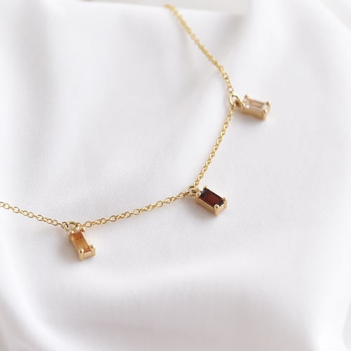 Goldenes Armband mit Citrin, Granat und Saphir Veera
