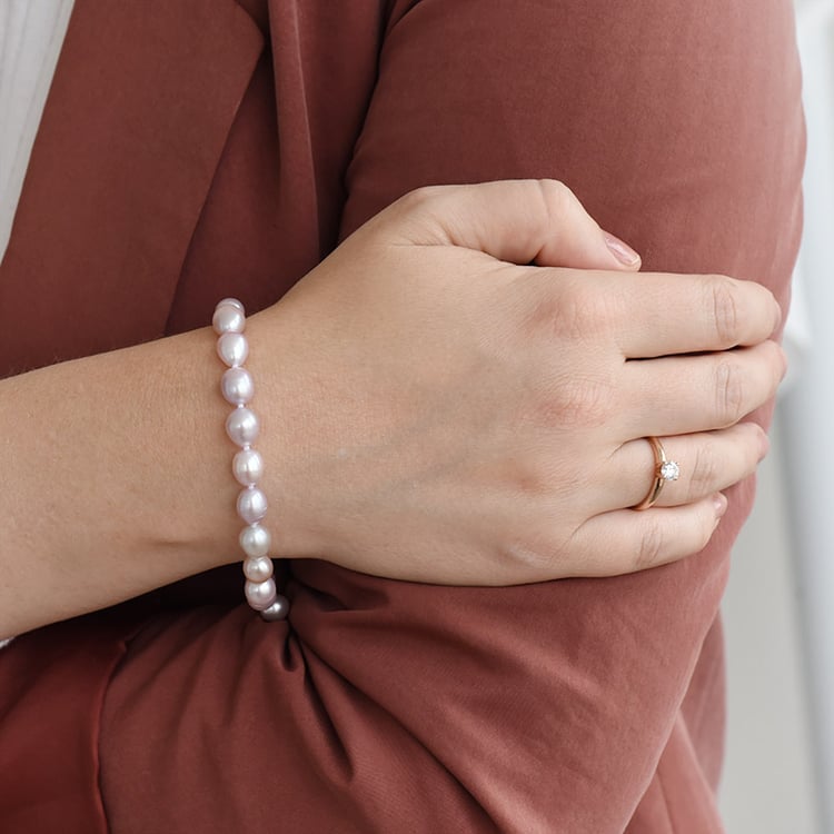 Armband mit lavendelfarbenen Perlen Biel 87866