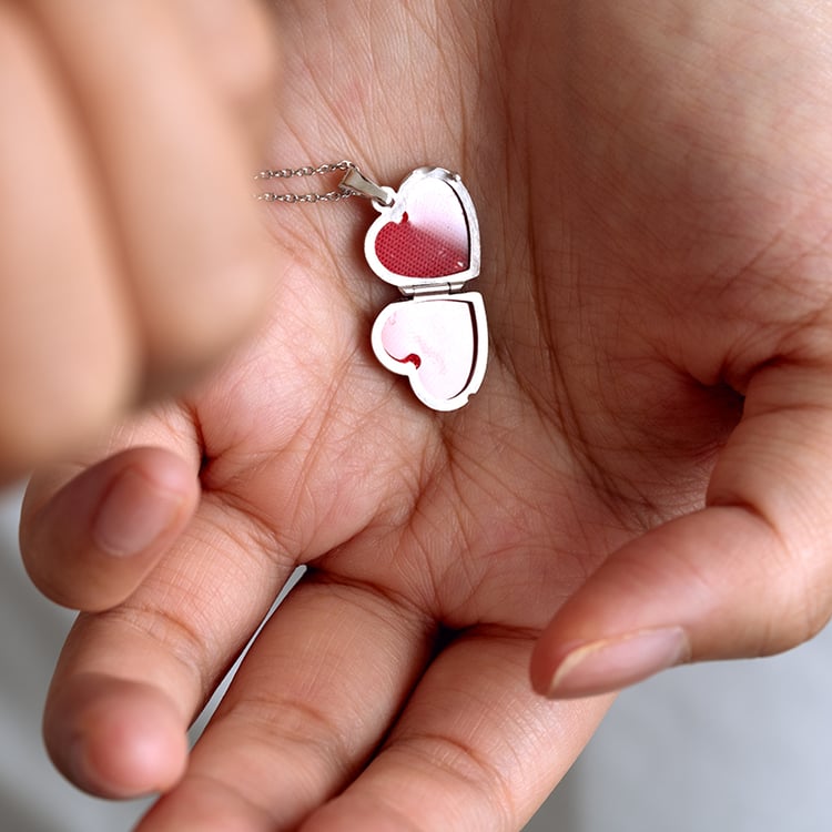 Silbernes Medaillon in Herzform zum Öffnen 129375