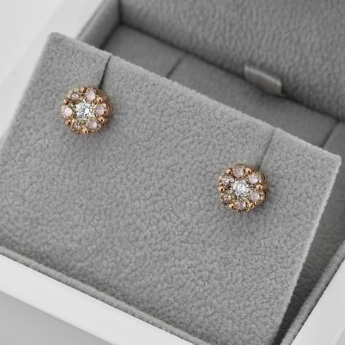 Ohrstecker in Blumenform mit brauen Diamanten Oakley