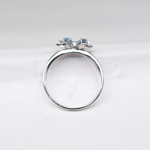 Verlobungsring mit Topasen und Diamanten Zusia