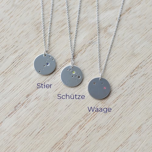 Silberner Anhänger mit Sternbild und Edelstein Nyala