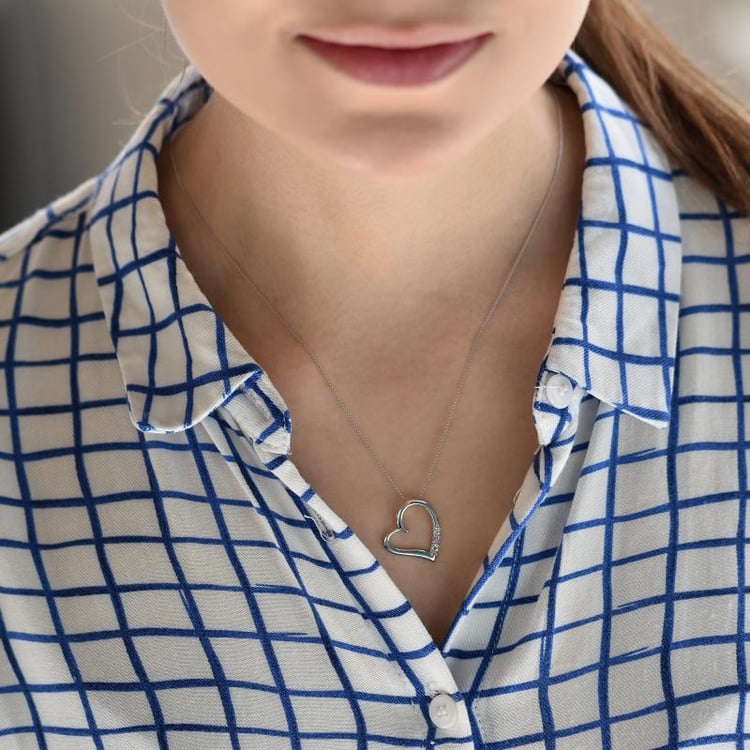 Silberner Anhänger mit einem Herzen mit Aquamarinen und einem rosa Saphir Tanish 103588