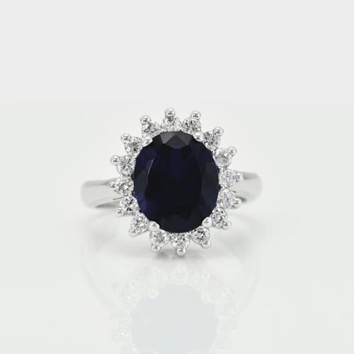 Goldener Ring mit blauem Saphir und Diamanten Tubiah