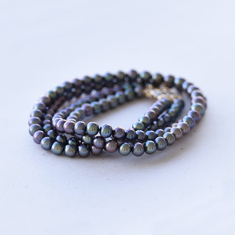 Goldene Perlenkette mit schwarzen Perlen Idhitri 58838