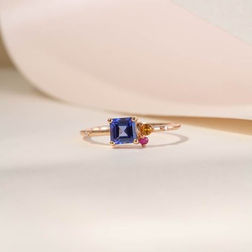 Cluster-Ring mit einem Asscher Tansaniten, Padparadscha-Saphir, Rubin und Diamant Kenny