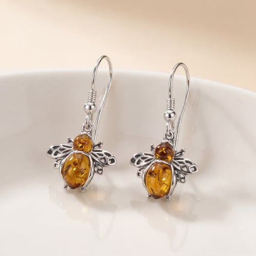 Silberne Ohrringe mit Bernsteinen in Bienenform Pomeline