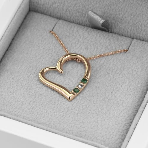Anhänger in Herz-Form aus Gold mit Smaragden und Diamant Tanish