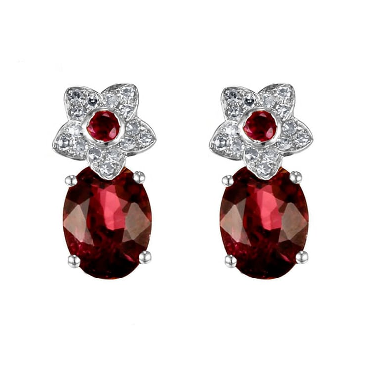 Goldene Turmalinohrringe aus Gold mit Diamantbůüte Isabella 82753