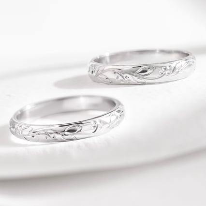 Platin Trauringe mit Blumenmotiv Montros