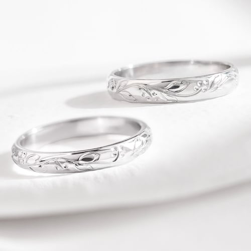 Platin Trauringe mit Blumenmotiv Montros