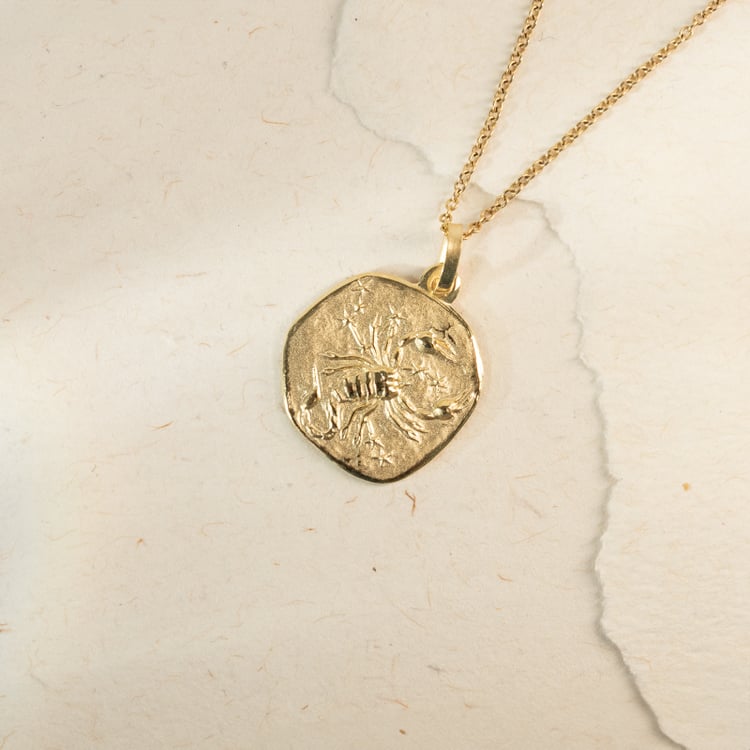 Goldanhänger mit Symbolen des Tierkreiszeichens 143663