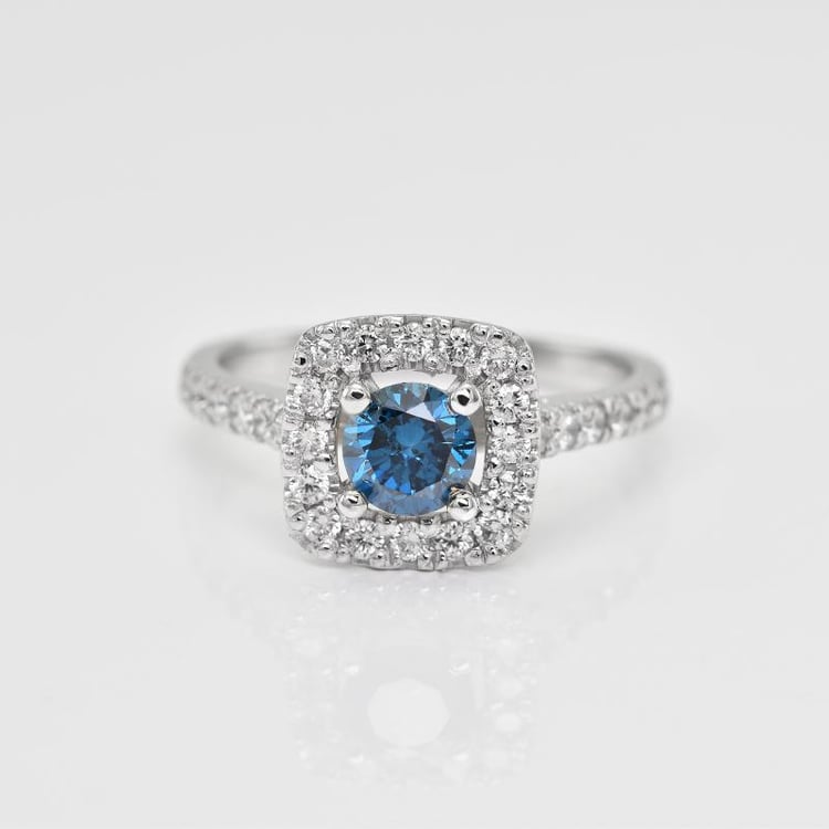 Ring aus Weißgold mit blauem Diamanten 22337