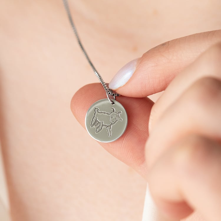 Silberner Anhänger mit der Gravur eines Lamms Der Kleine Prinz 139141