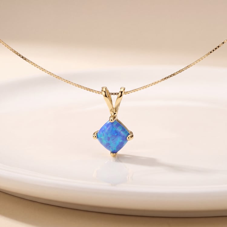 Goldener Anhänger mit blauen Topas Gea 170687