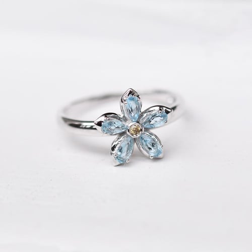 Verlobungsring mit Topasen und Diamanten Zusia
