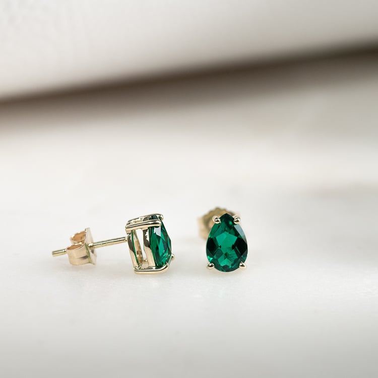 Ohrringe aus Gold mit Tropfenschliff Smaragden Reata 133820