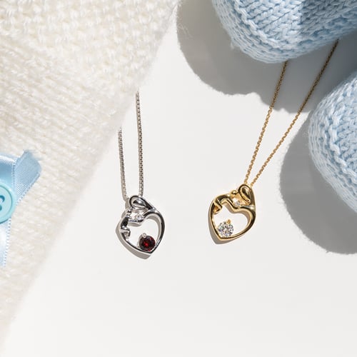 Silberner Anhänger Mutter und Kind mit Granat und Diamant Ella