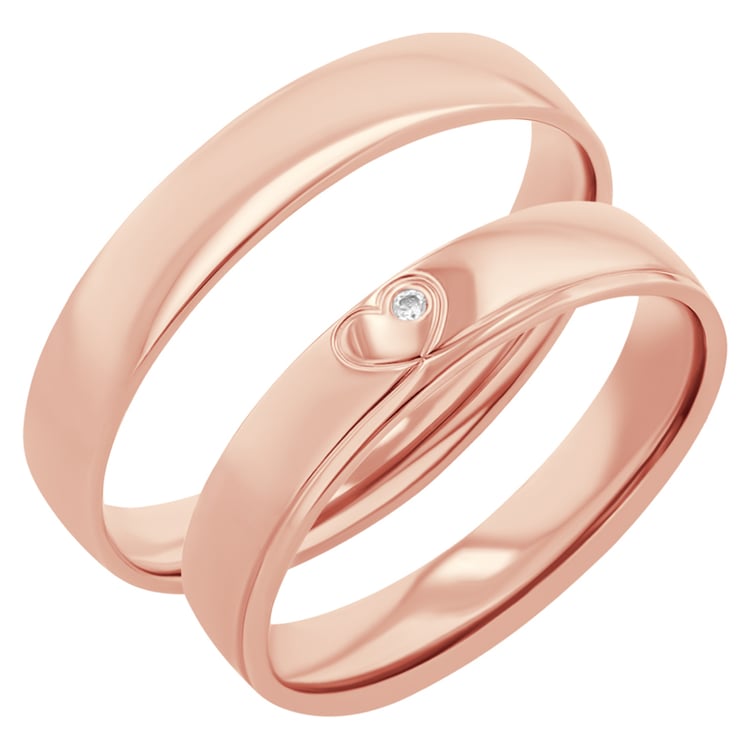 Goldene Eheringe mit einem Herzen und einem Diamanten Maline