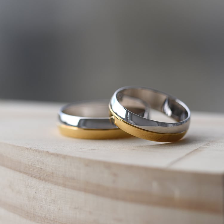 Halbrunde Eheringe aus kombiniertem Gold Amann 61453
