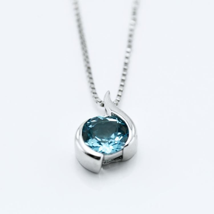 Silberne Anhänger mit Topas Thirumal 15045